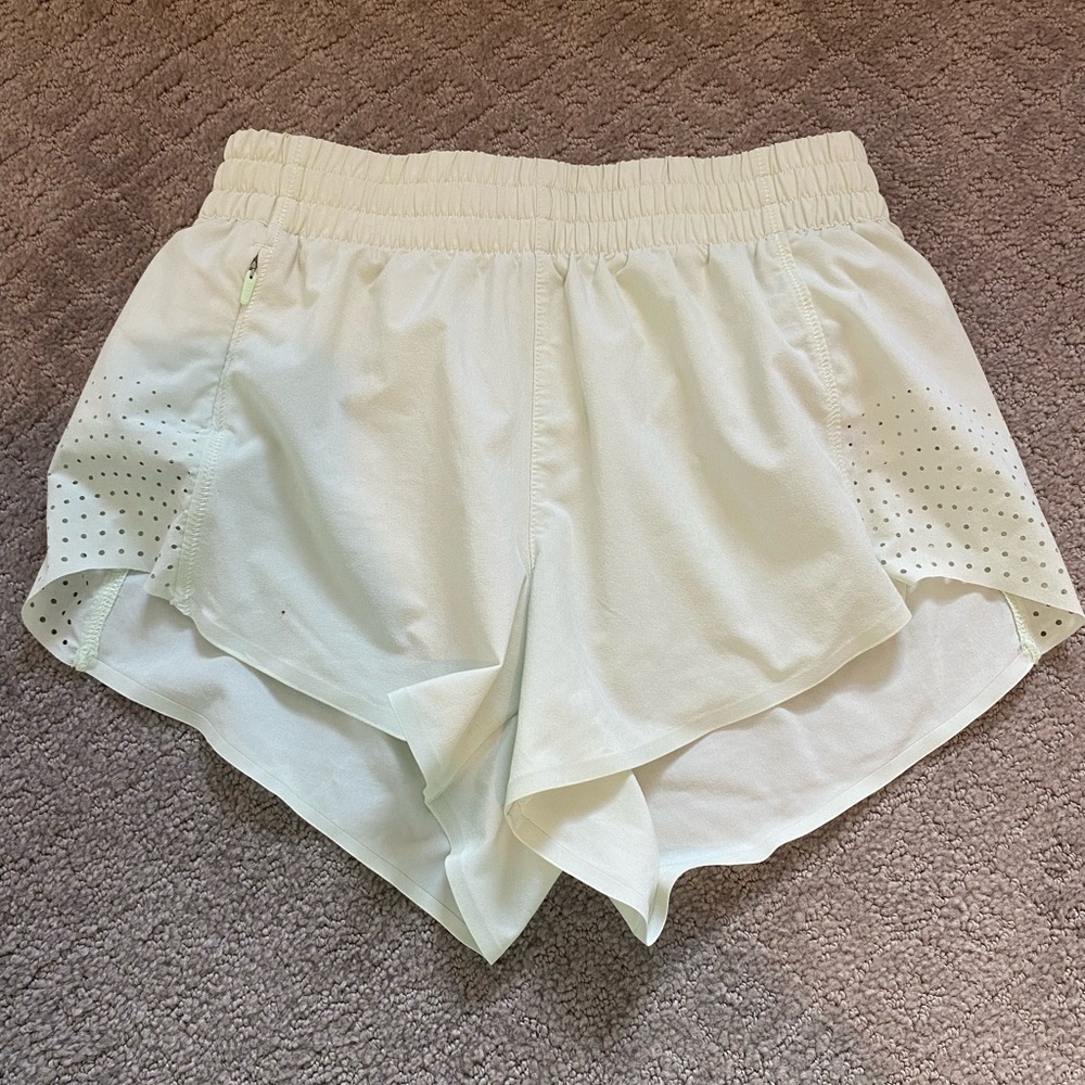 Athleta Hustle 3 in Athletic Shorts; light green